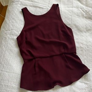 ASTR maroon peplum tank with zipper detail in the back